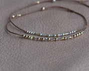 Strength Morse Code Bracelet w/ Swarovski Spacers - Dainty 14K Gold & Silver Jewelry by Olivia Cactus