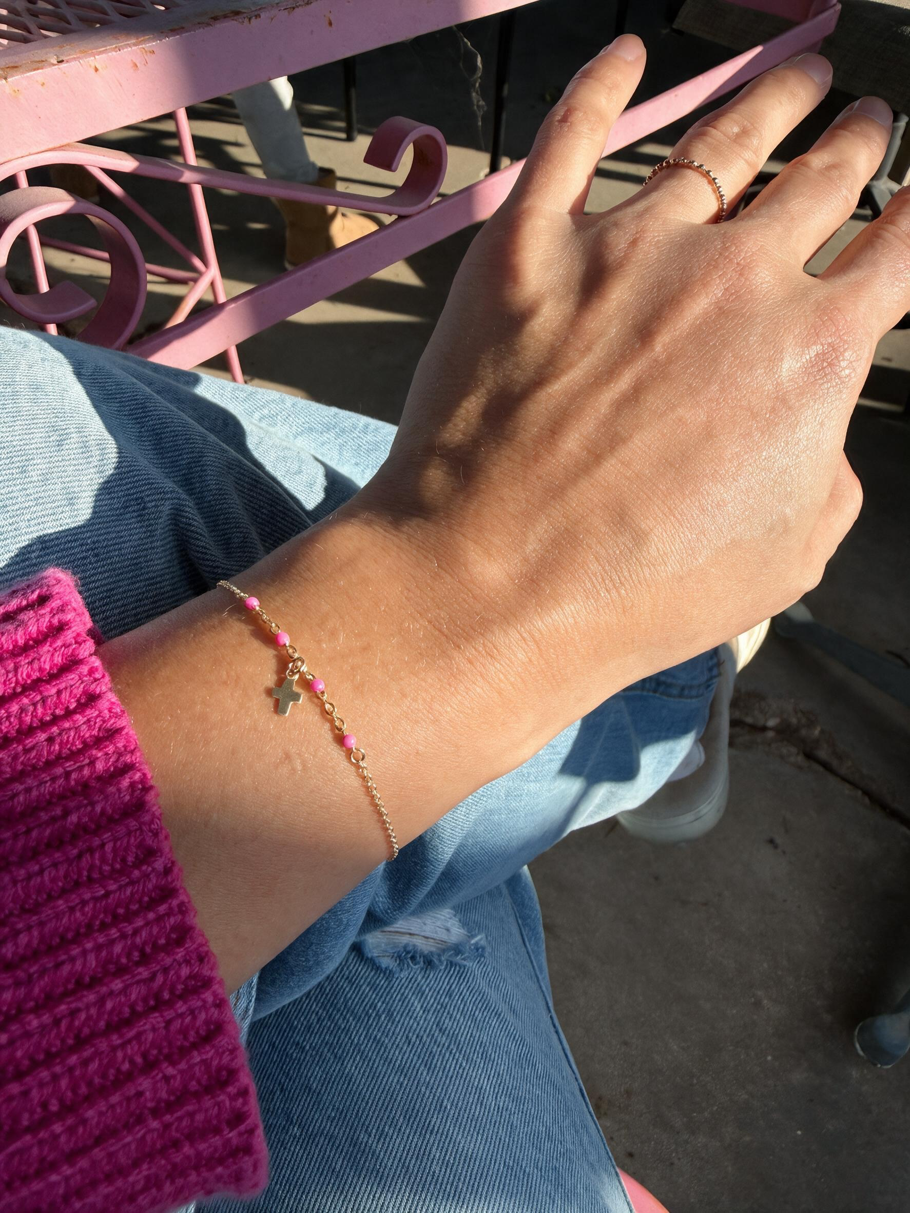 Gold Cross Bracelet with Pink Accents