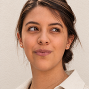 Woman wearing the Iris CZ stud earrings and a dainty 14k gold filled necklace