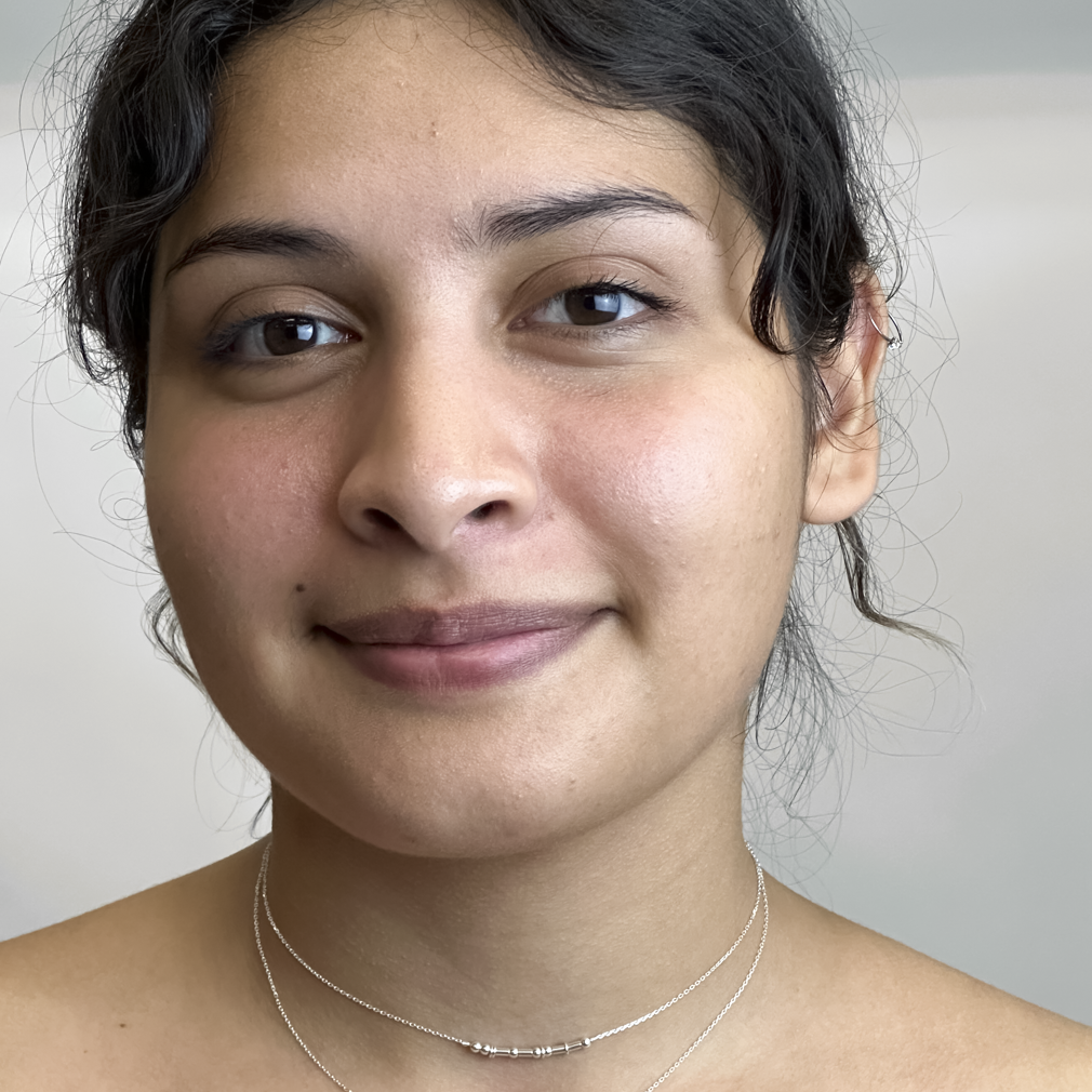 Model wearing the personalized Morse code necklace in bold sterling silver