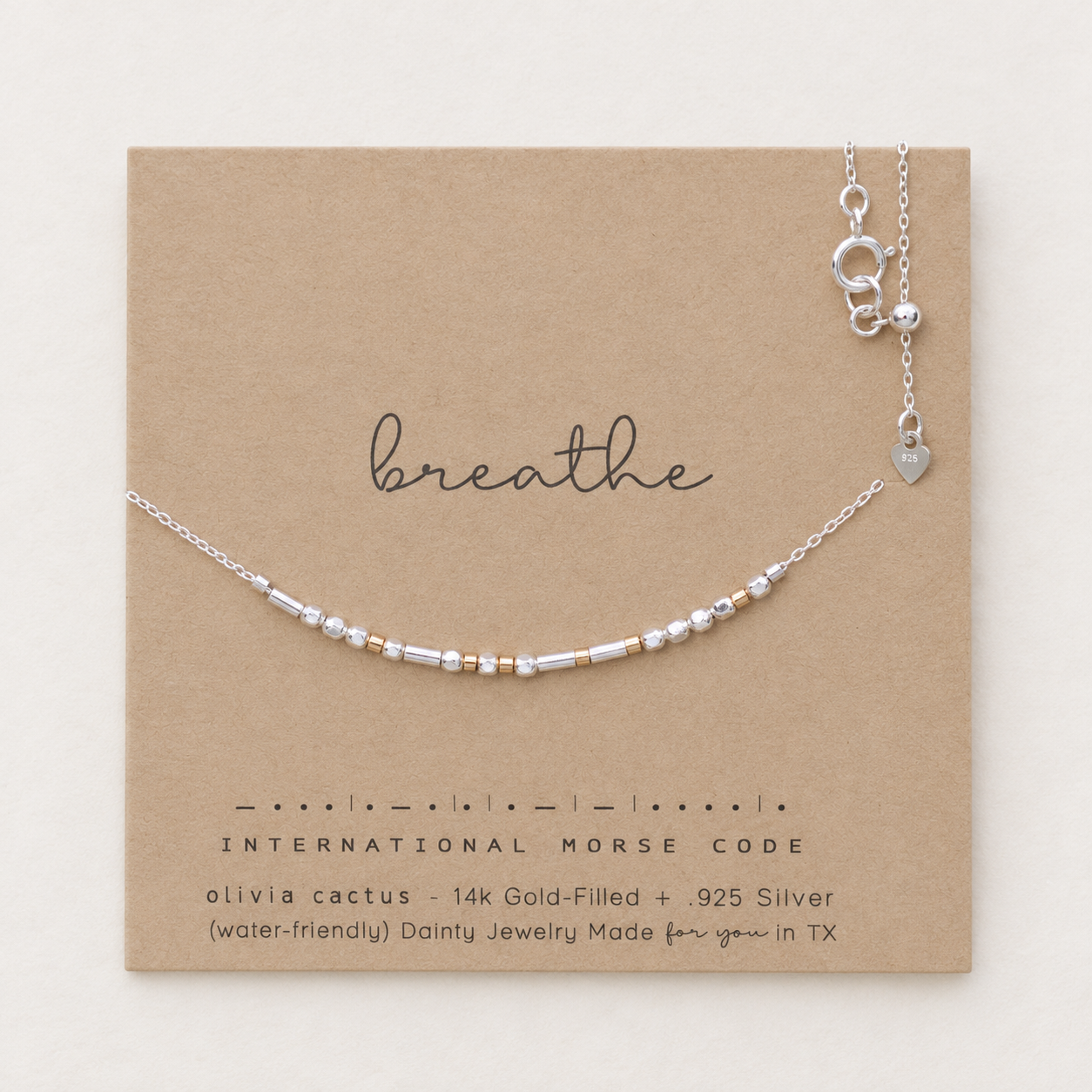 Breathe Morse code necklace in sterling silver faceted beads with 14k gold-filled accents on a dainty silver chain, shown on an Olivia Cactus card