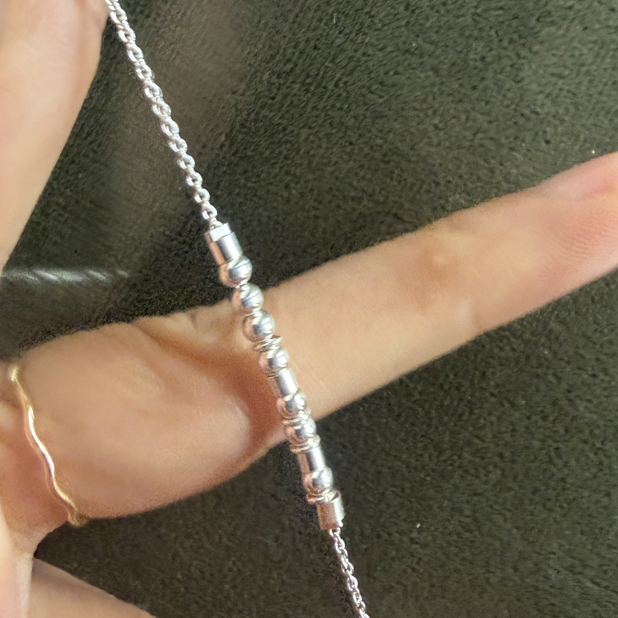 Detail of the round and tube sterling silver beads