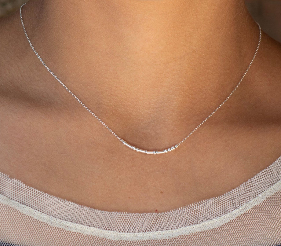 sterling silver Morse code necklace worn