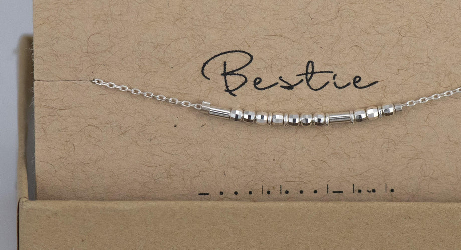 sterling silver Morse code bracelet on its kraft card