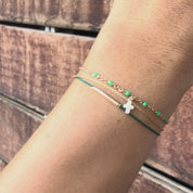 Gold Cross Bracelet with Pink Accents
